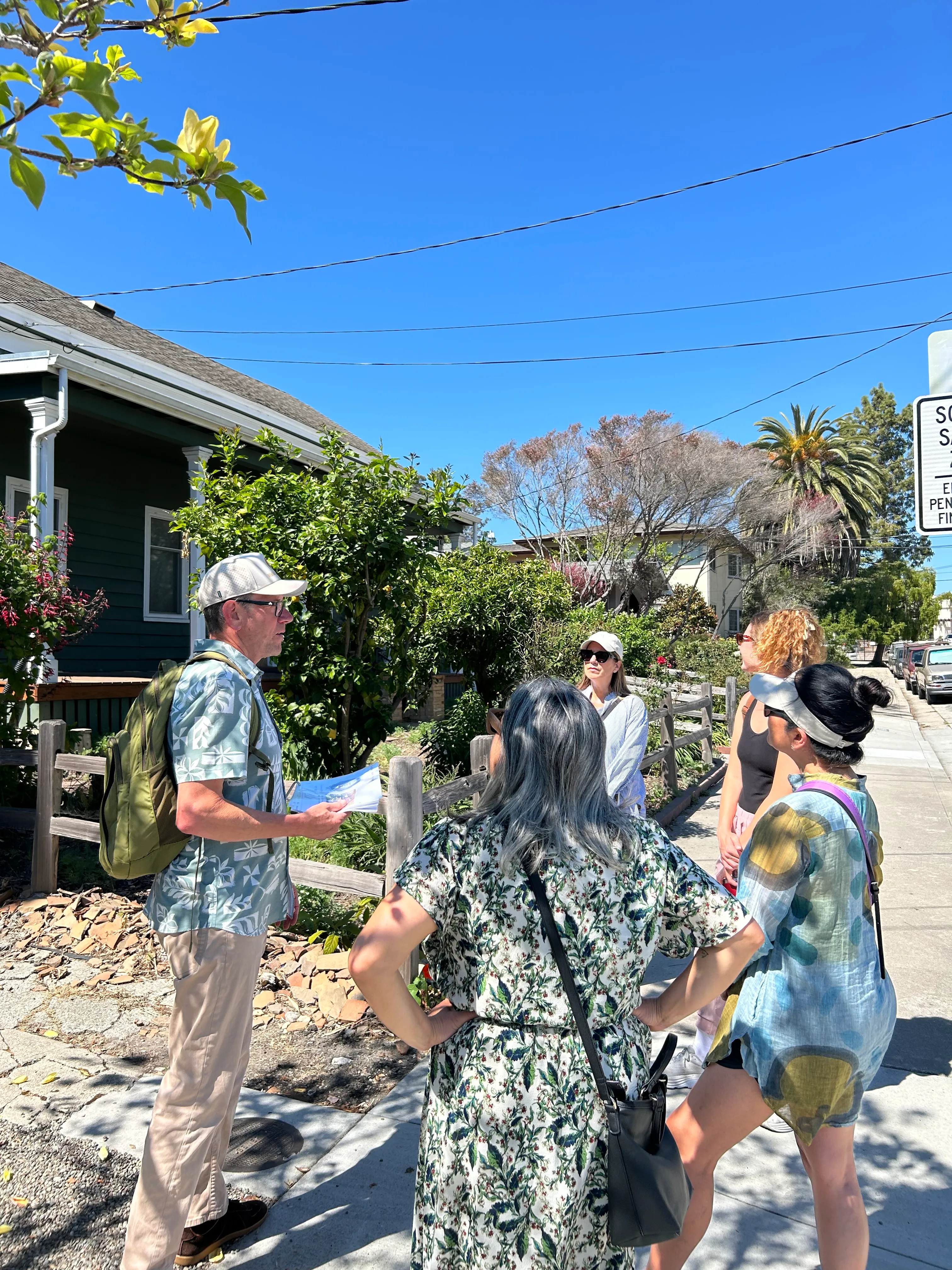 Tour group exploring a Santa Cruz neighborhood